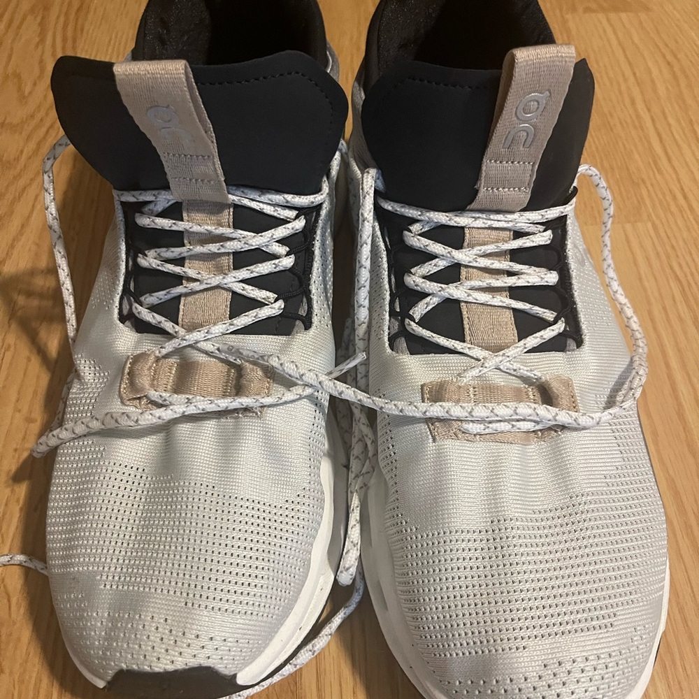 On Running Black and White Sneakers with Cushioned Sole